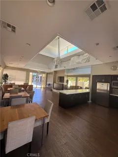 a view of a backyard with sitting area