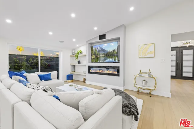 a view of a pathway both side of house