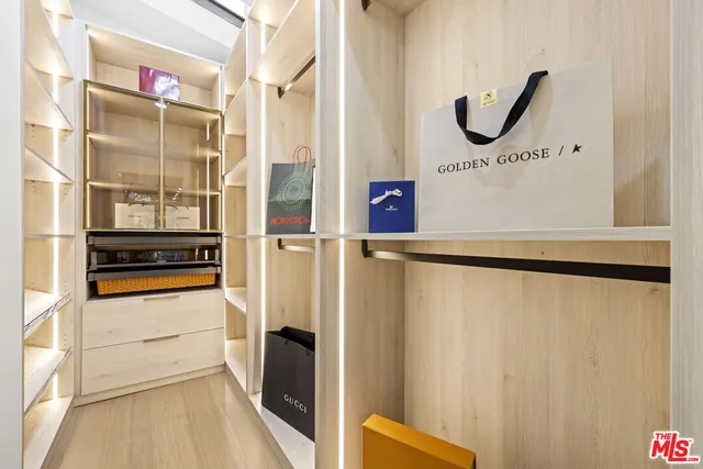 a view of a chairs and table on the wooden deck