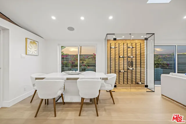 a view of deck with wooden floor and outdoor seating
