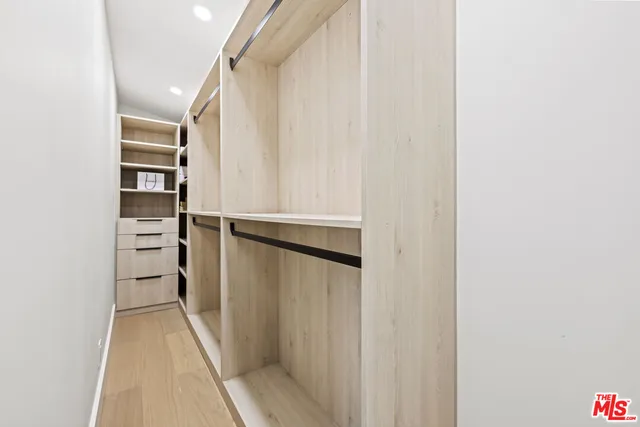 a bathroom with a granite countertop sink a toilet and bathtub