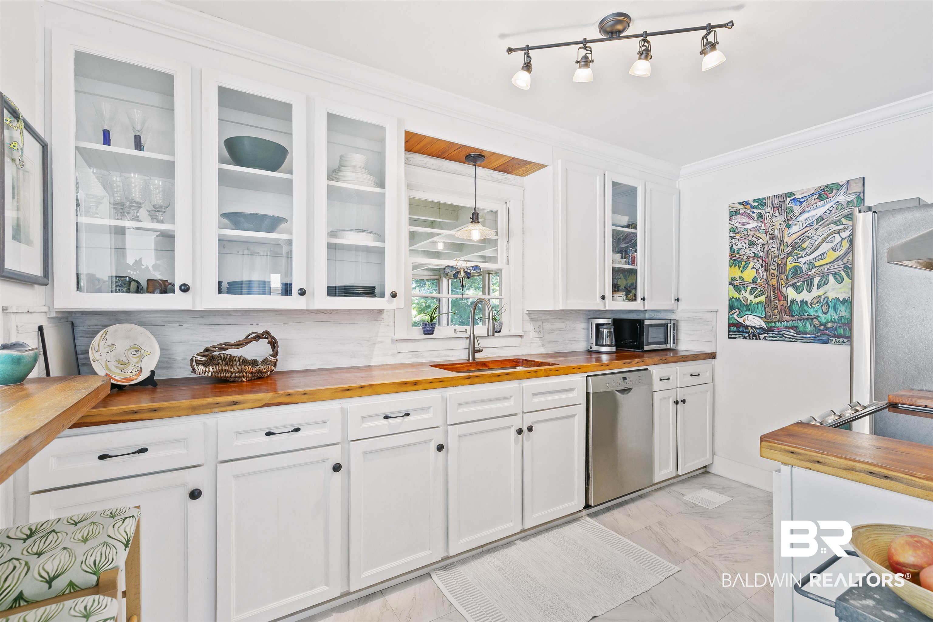 220 Pinecrest Lane Fairhope, AL 36532 - Photo 9 of 32 Kitchen with tasteful backsplash, sink, wood counters, hanging light fixtures, and stainless steel appliances