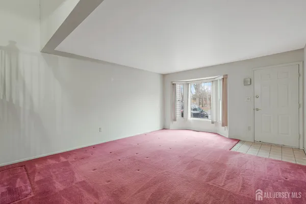 a view of empty room with window