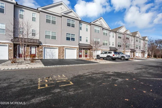 a city street lined with tall buildings