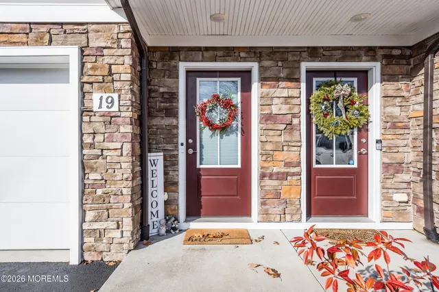a front view of a house with a garage