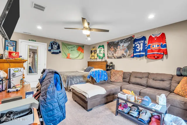 a view of a balcony with wooden floor and wooden fence