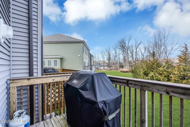 a view of a house with a yard porch and sitting area