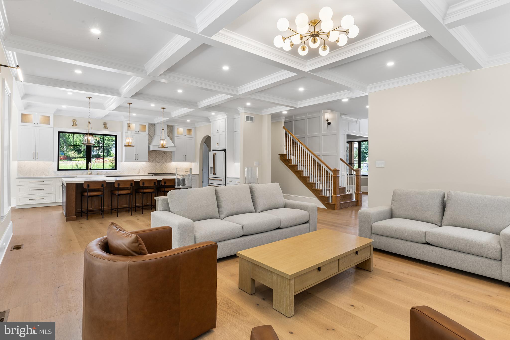 153 Kirk Road Garnet Valley, PA 19060 - Photo 11 of 66 a living room with furniture and a chandelier