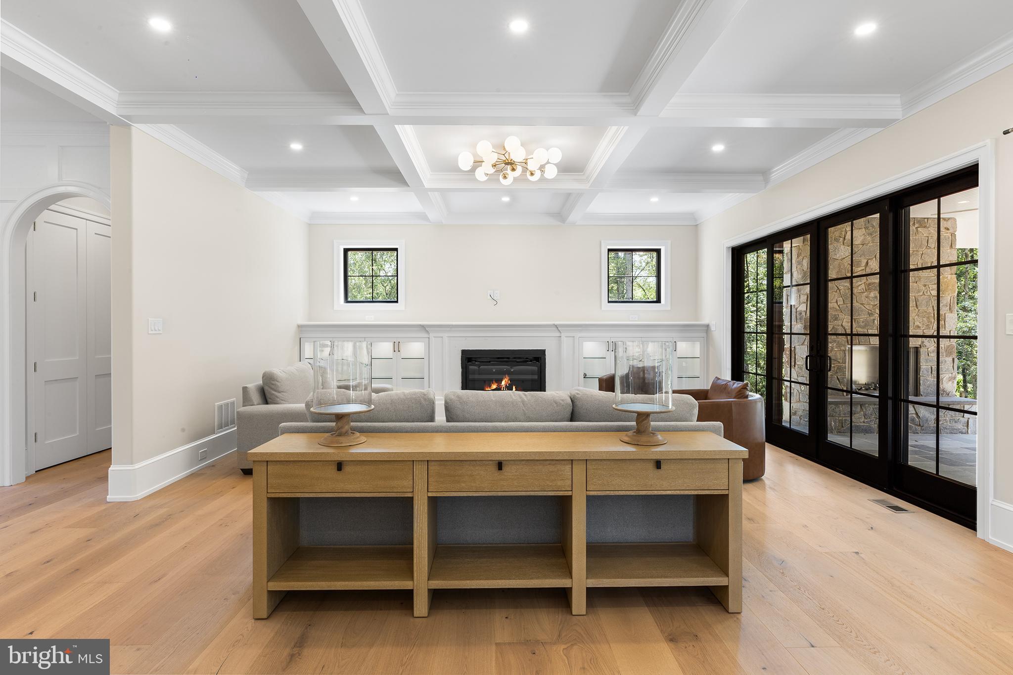 153 Kirk Road Garnet Valley, PA 19060 - Photo 12 of 66 a living room with furniture and a fireplace