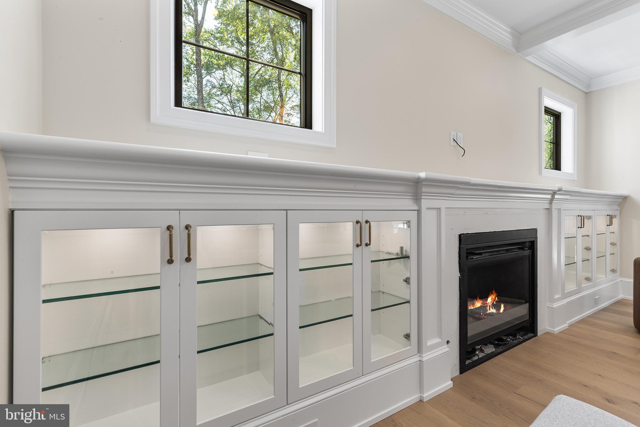 153 Kirk Road Garnet Valley, PA 19060 - Photo 13 of 66 a living room with furniture and a fireplace