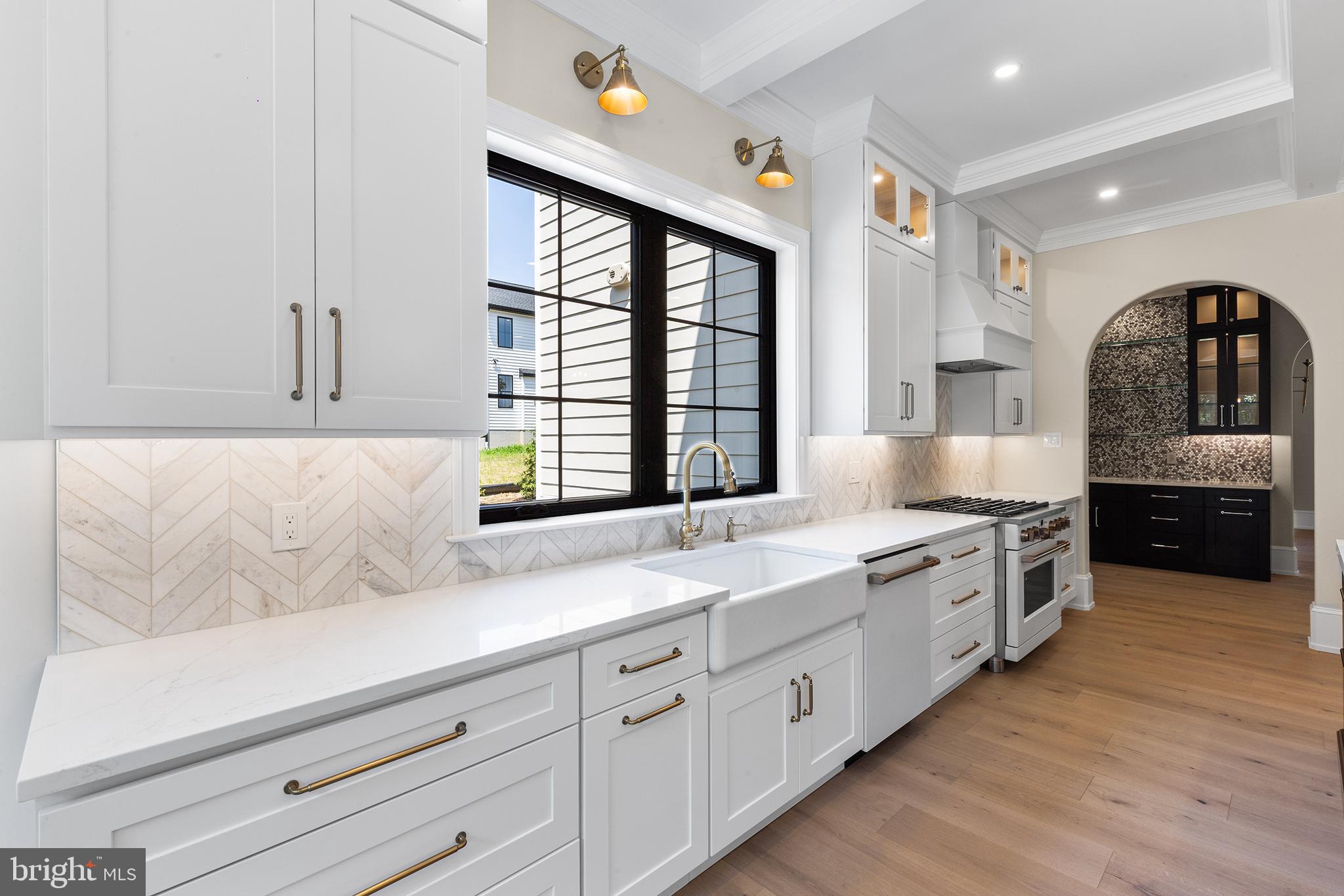 153 Kirk Road Garnet Valley, PA 19060 - Photo 16 of 66 a spacious bathroom with double vanity and a large mirror