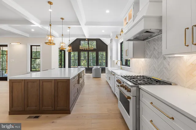 a bathroom with bathtub and window