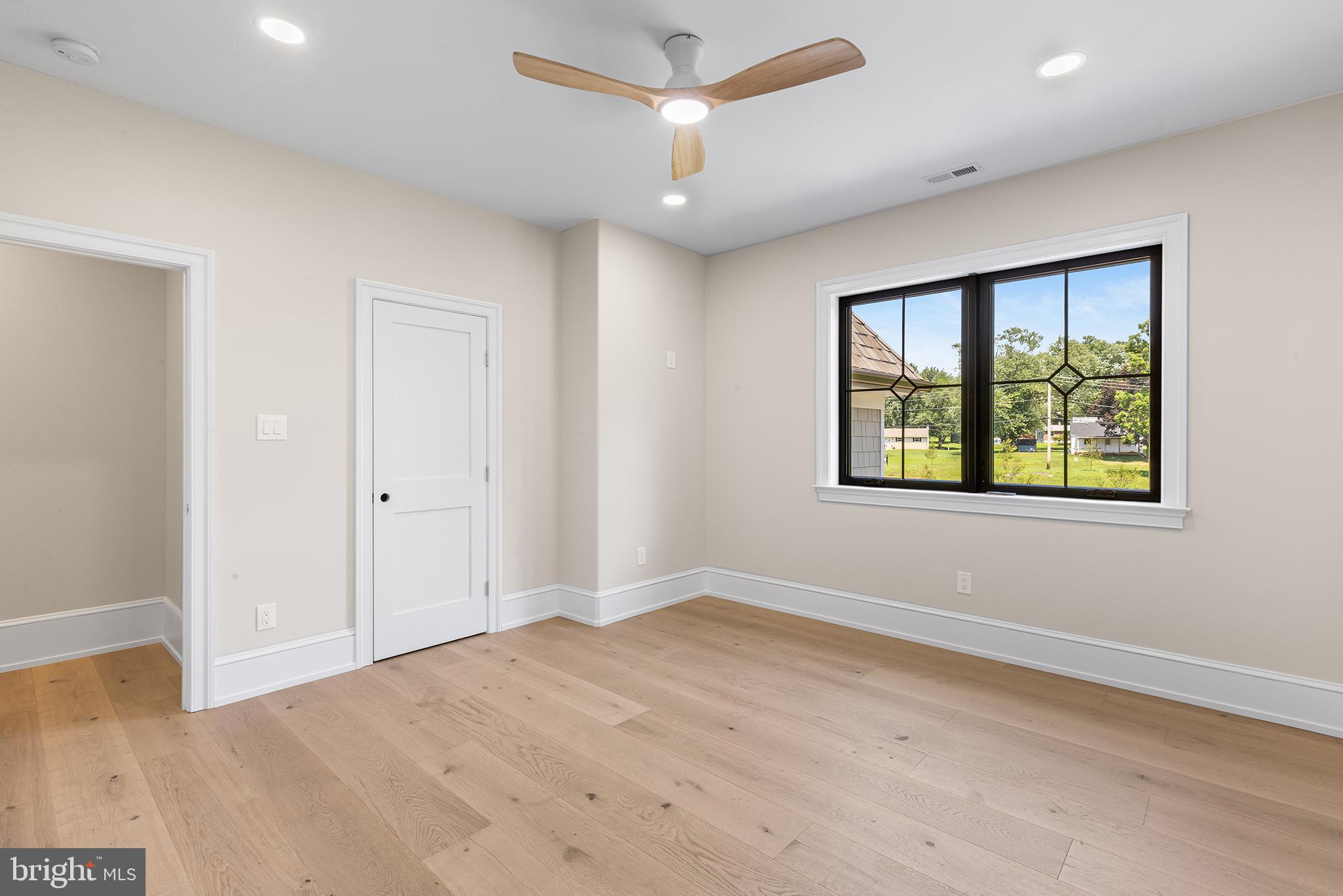 153 Kirk Road Garnet Valley, PA 19060 - Photo 43 of 66 a view of an empty room with a window