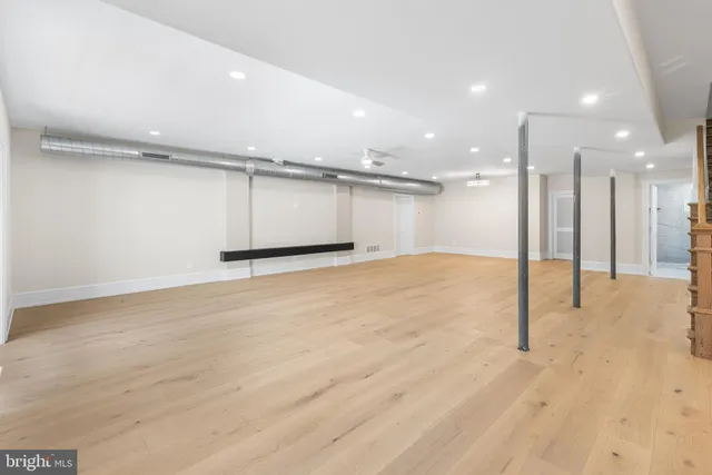 a view of a swimming pool with an outdoor space and seating area