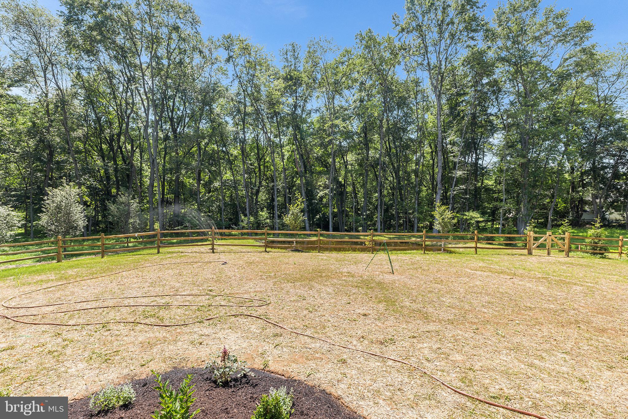 153 Kirk Road Garnet Valley, PA 19060 - Photo 66 of 66 a view of a swimming pool with an outdoor space and seating area