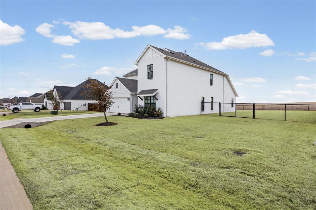 9437 Wildcat Ridge Godley, TX 76044 - Photo 3 of 37 a view of a house with a yard