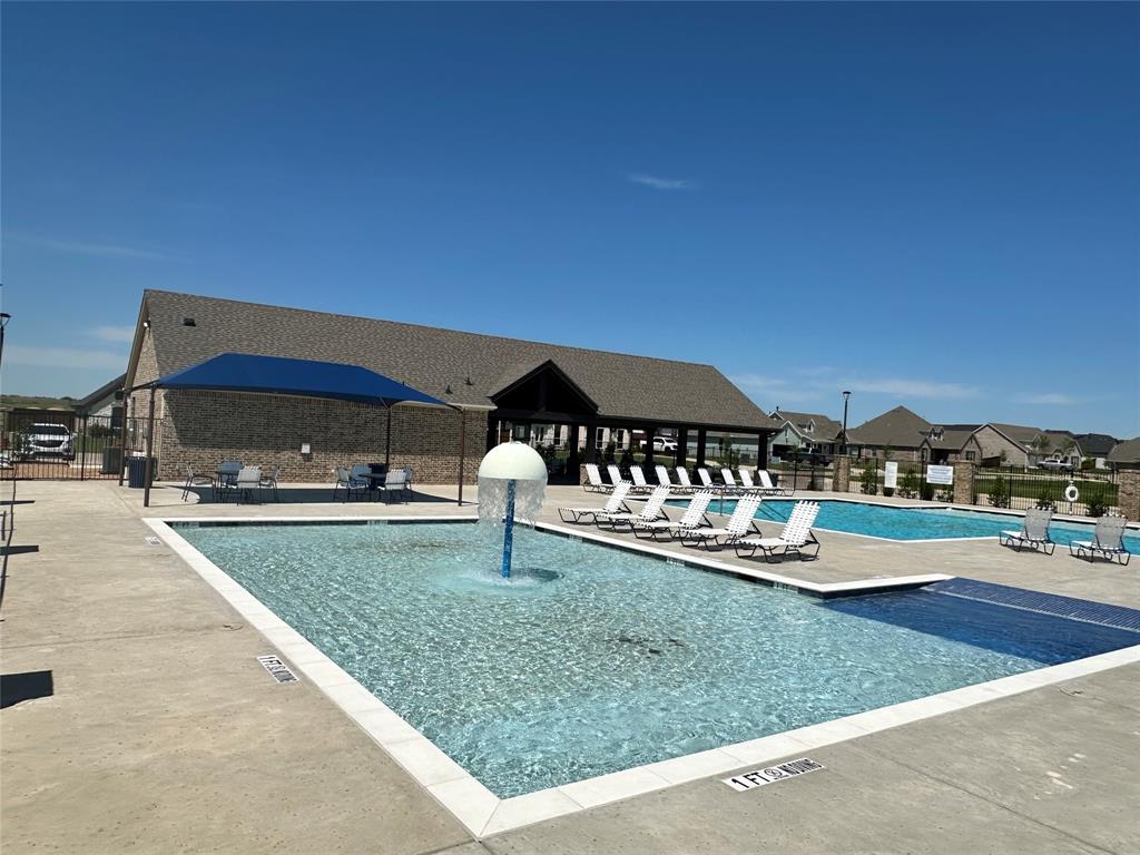 9437 Wildcat Ridge Godley, TX 76044 - Photo 34 of 37 a front view of house with yard