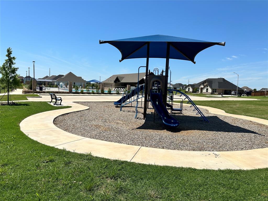 9437 Wildcat Ridge Godley, TX 76044 - Photo 36 of 37 a house view with a outdoor space