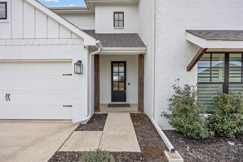 9437 Wildcat Ridge Godley, TX 76044 - Photo 4 of 37 a view of a entryway door of the house
