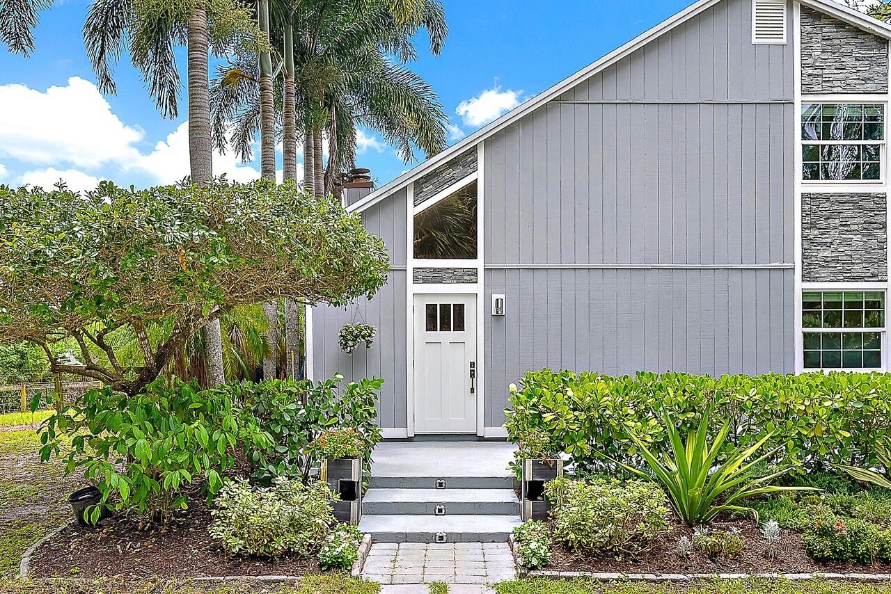 15629 95th Avenue North Jupiter, FL 33478 - Photo 15 of 22 a house view with a outdoor space
