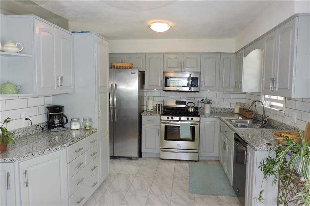 243 Pond Road Wayne, ME 04284 - Photo 3 of 33 Updated kitchen with granite and...