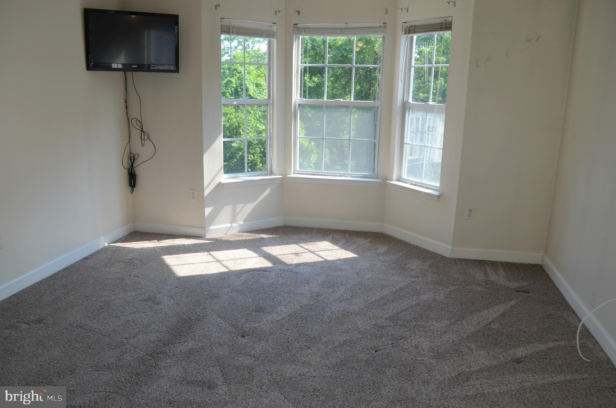 6505 Springwater Court, Unit 7403 Frederick, MD 21701 - Photo 15 of 39 Master bedroom with TV that conveys, bay window