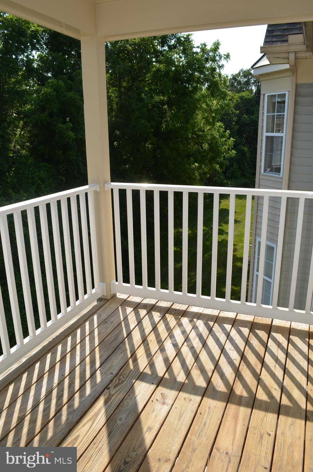 6505 Springwater Court, Unit 7403 Frederick, MD 21701 - Photo 9 of 39 Enjoy looking at woods on your balcony
