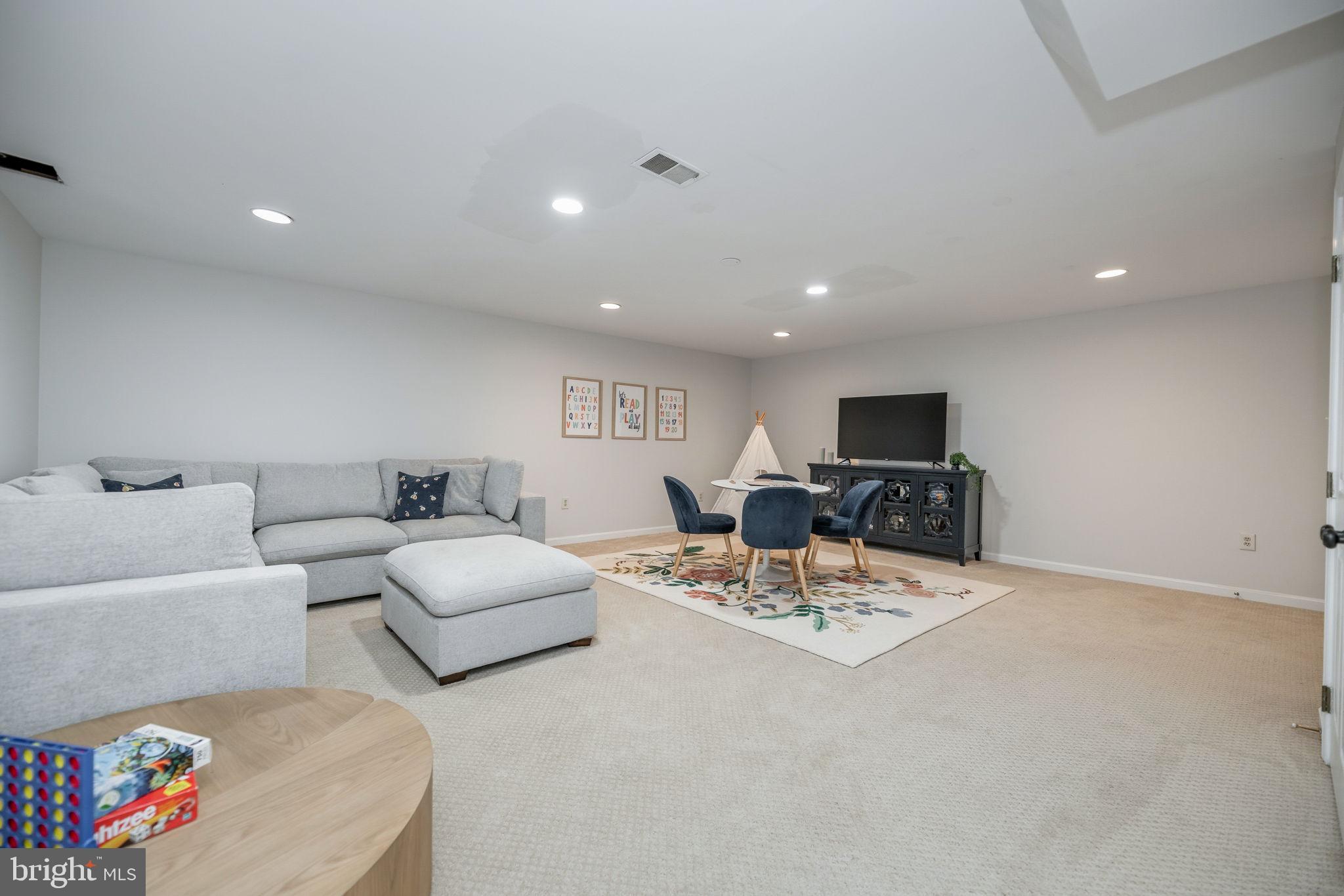 7603 Modisto Lane Springfield, VA 22153 - Photo 38 of 57 a living room with furniture and white walls