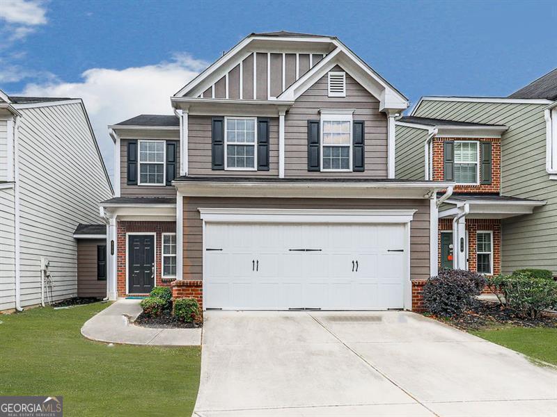 512 Constellation Overlook Atlanta, GA 30331 - Photo 1 of 1 a front view of a house with garden