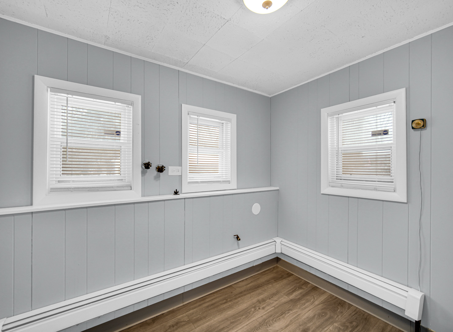 3009 Olive Road Homewood, IL 60430 - Photo 16 of 23 a view of an empty room with wooden floor and a window