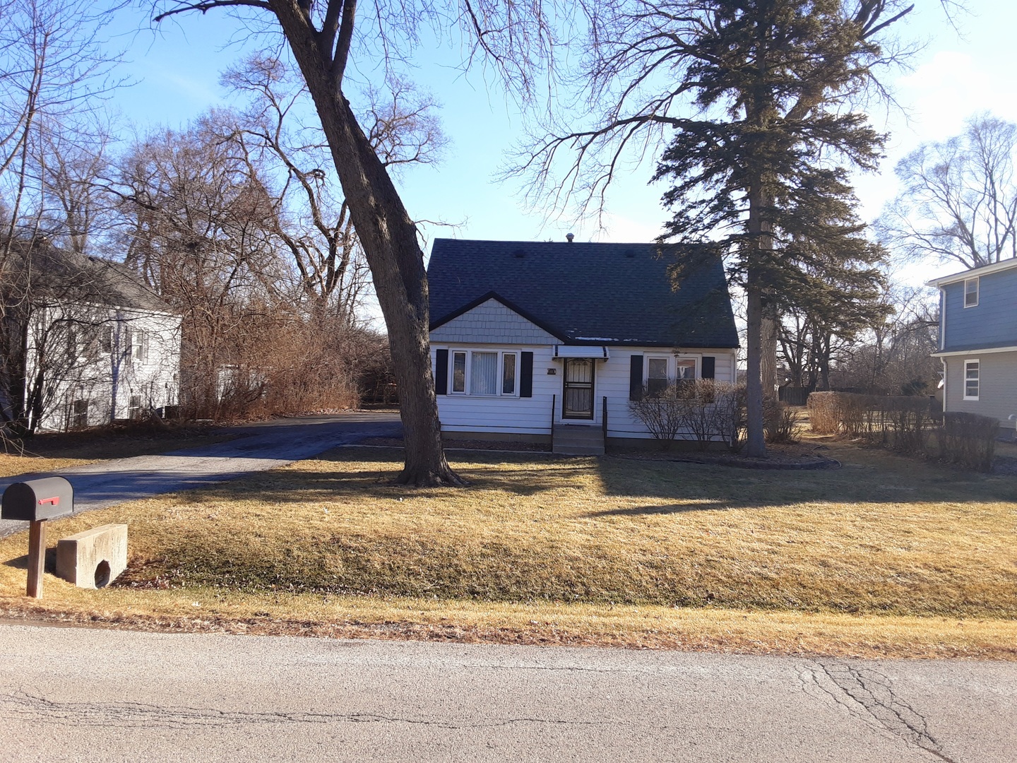 3009 Olive Road Homewood, IL 60430 - Photo 23 of 23 a view of a house with a yard covered in snow