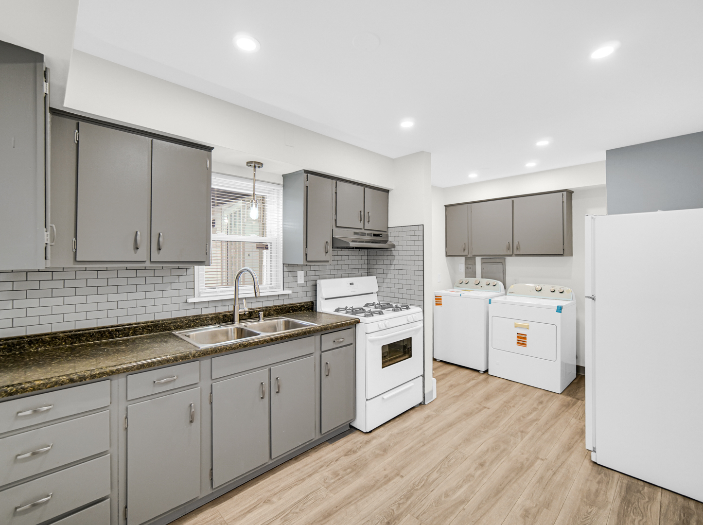 3009 Olive Road Homewood, IL 60430 - Photo 9 of 23 a kitchen with white cabinets and white appliances
