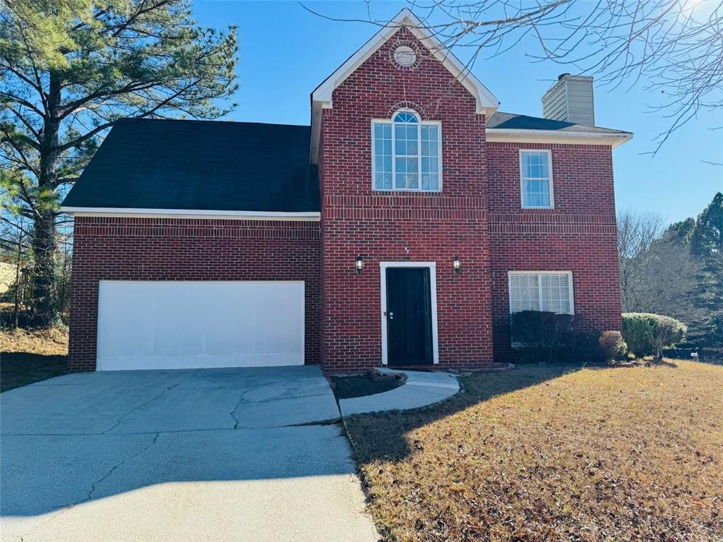 2919 Riverwalk Cove Decatur, GA 30034 - Photo 1 of 1 a front view of a house with a yard
