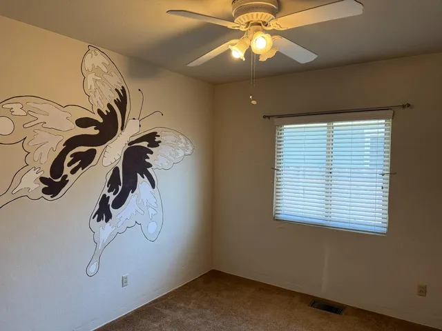 a view of a room with a window