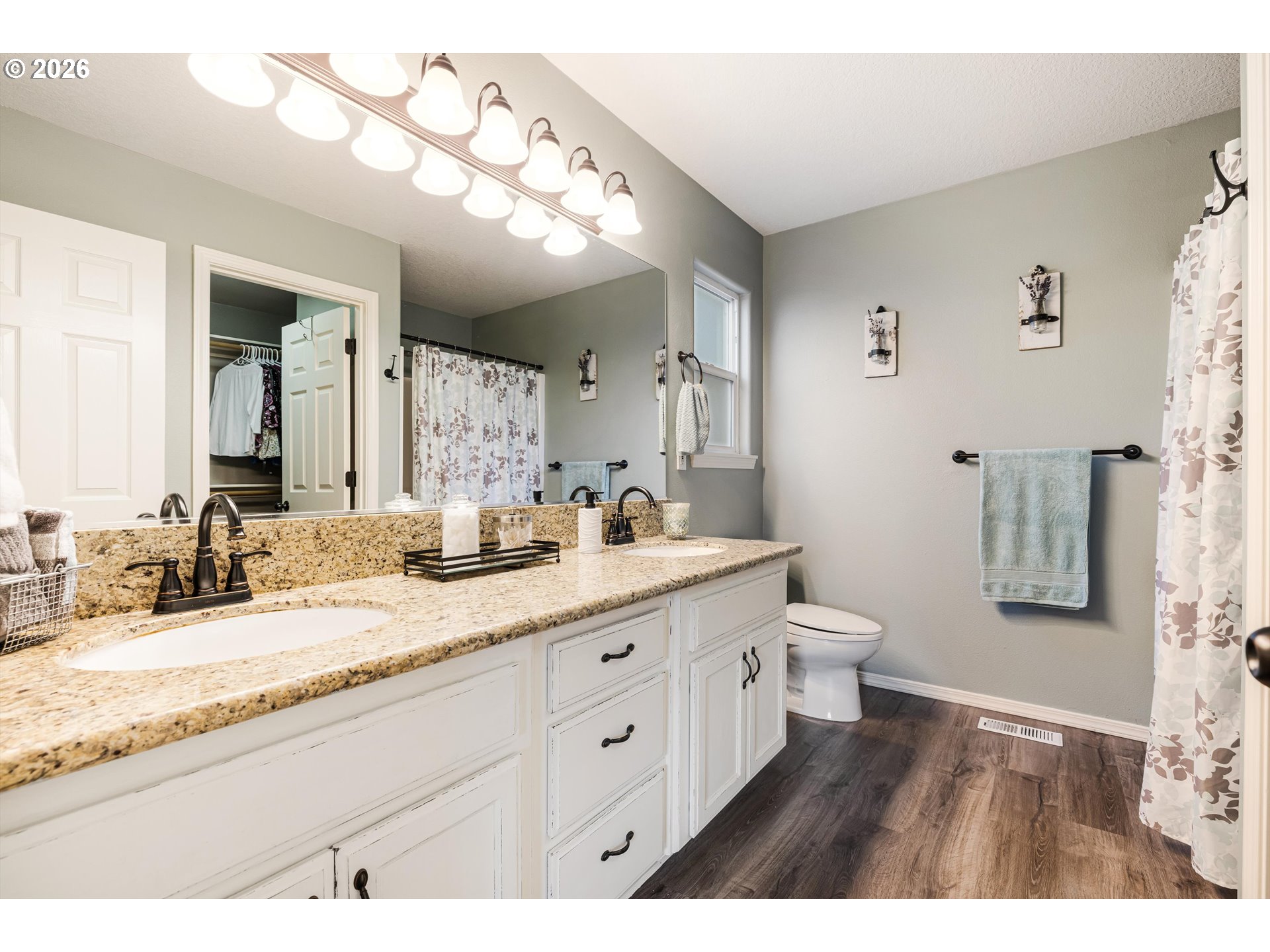 11769 Payson Lane Oregon City, OR 97045 - Photo 20 of 29 a bathroom with a granite countertop sink mirror and a toilet