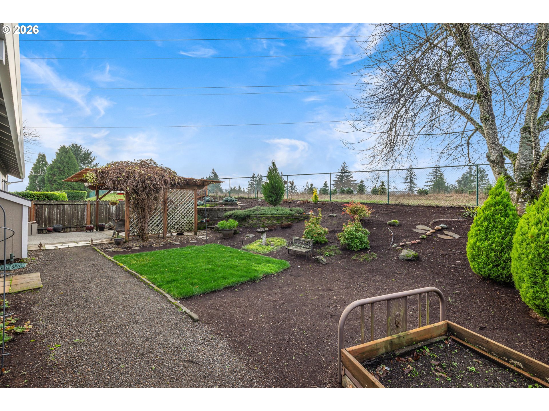 11769 Payson Lane Oregon City, OR 97045 - Photo 28 of 29 a backyard of a house with lots of green space