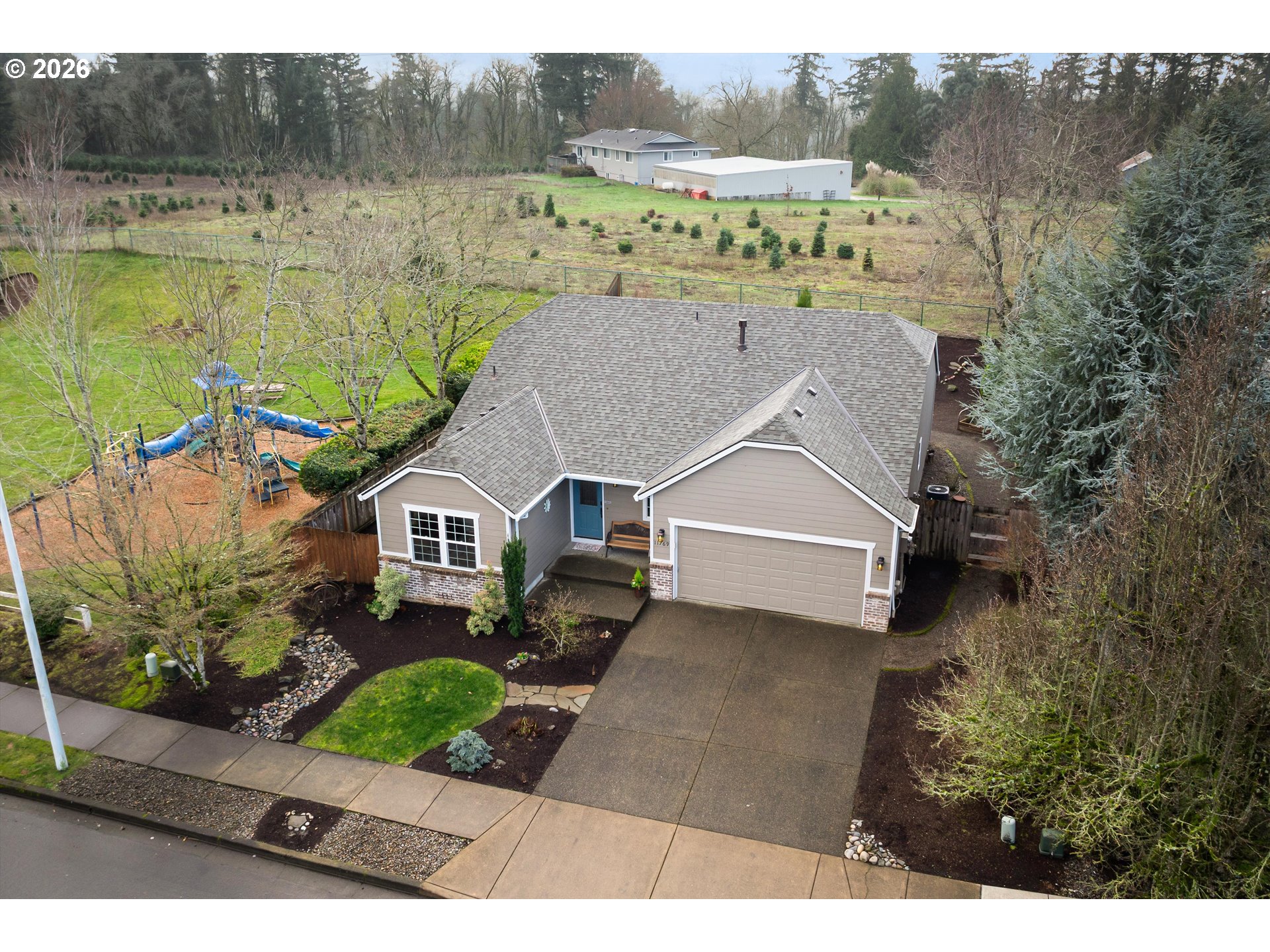 11769 Payson Lane Oregon City, OR 97045 - Photo 4 of 29 a aerial view of a house with a yard and a large tree