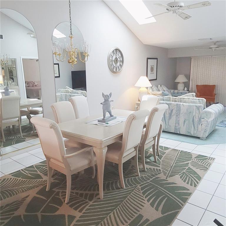 9344 Links Lane, Unit 9344 New Port Richey, FL 34655 - Photo 6 of 40 a view of a dining room with furniture
