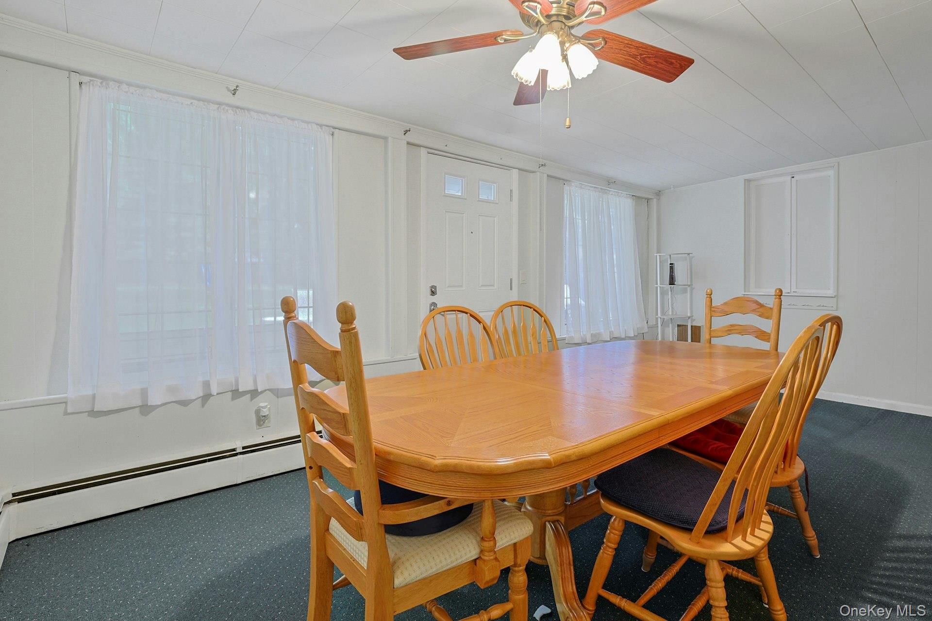 31 Townline Road Pearl River, NY 10965 - Photo 12 of 27 a view of a dining room with furniture and chandelier