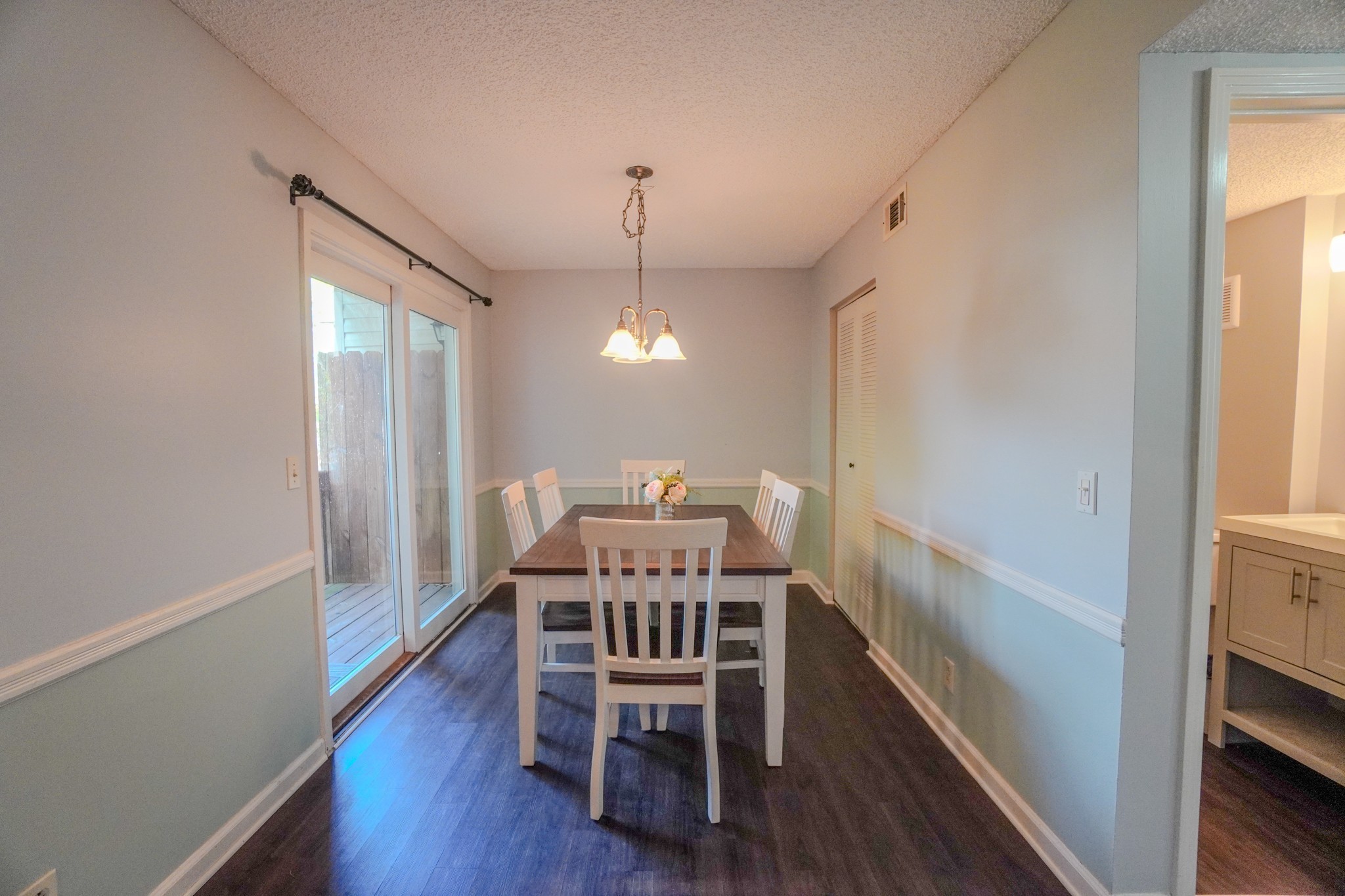 4000 Anderson Road, Unit 44 Nashville, TN 37217 - Photo 24 of 78 a view of a dining room with furniture and wooden floor