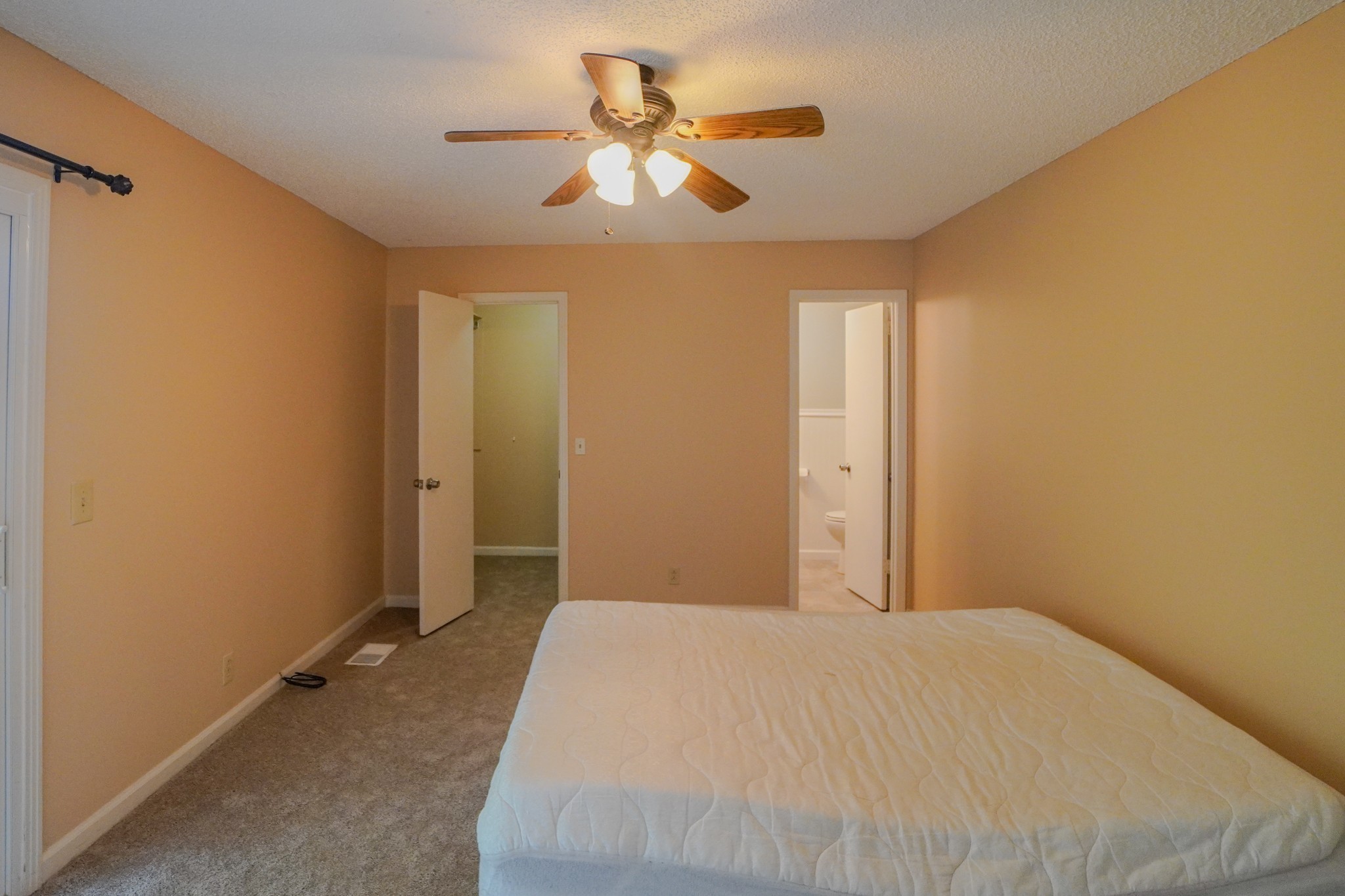 4000 Anderson Road, Unit 44 Nashville, TN 37217 - Photo 38 of 78 a bedroom with a bed and a ceiling fan