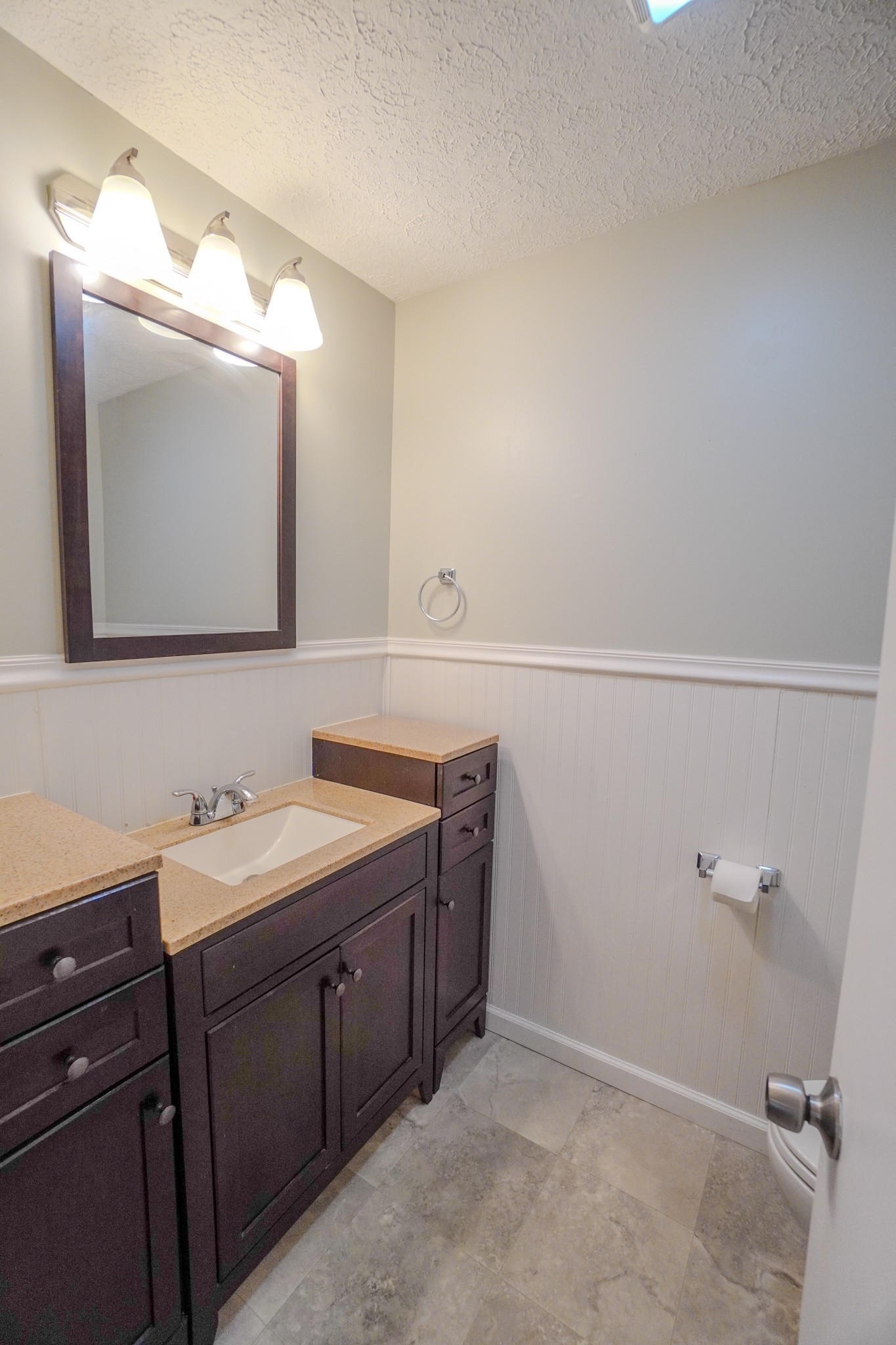4000 Anderson Road, Unit 44 Nashville, TN 37217 - Photo 44 of 78 a bathroom with a double vanity sink and mirror