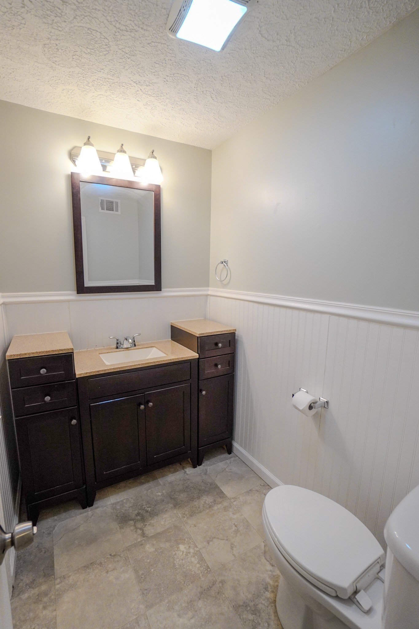 4000 Anderson Road, Unit 44 Nashville, TN 37217 - Photo 49 of 78 a bathroom with a toilet sink vanity granite and mirror