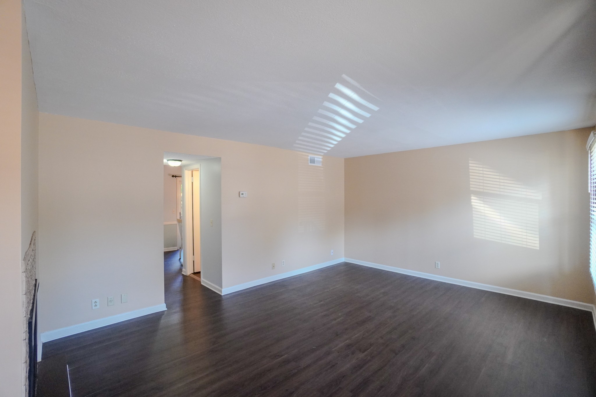 4000 Anderson Road, Unit 44 Nashville, TN 37217 - Photo 9 of 78 an empty room with wooden floor and window