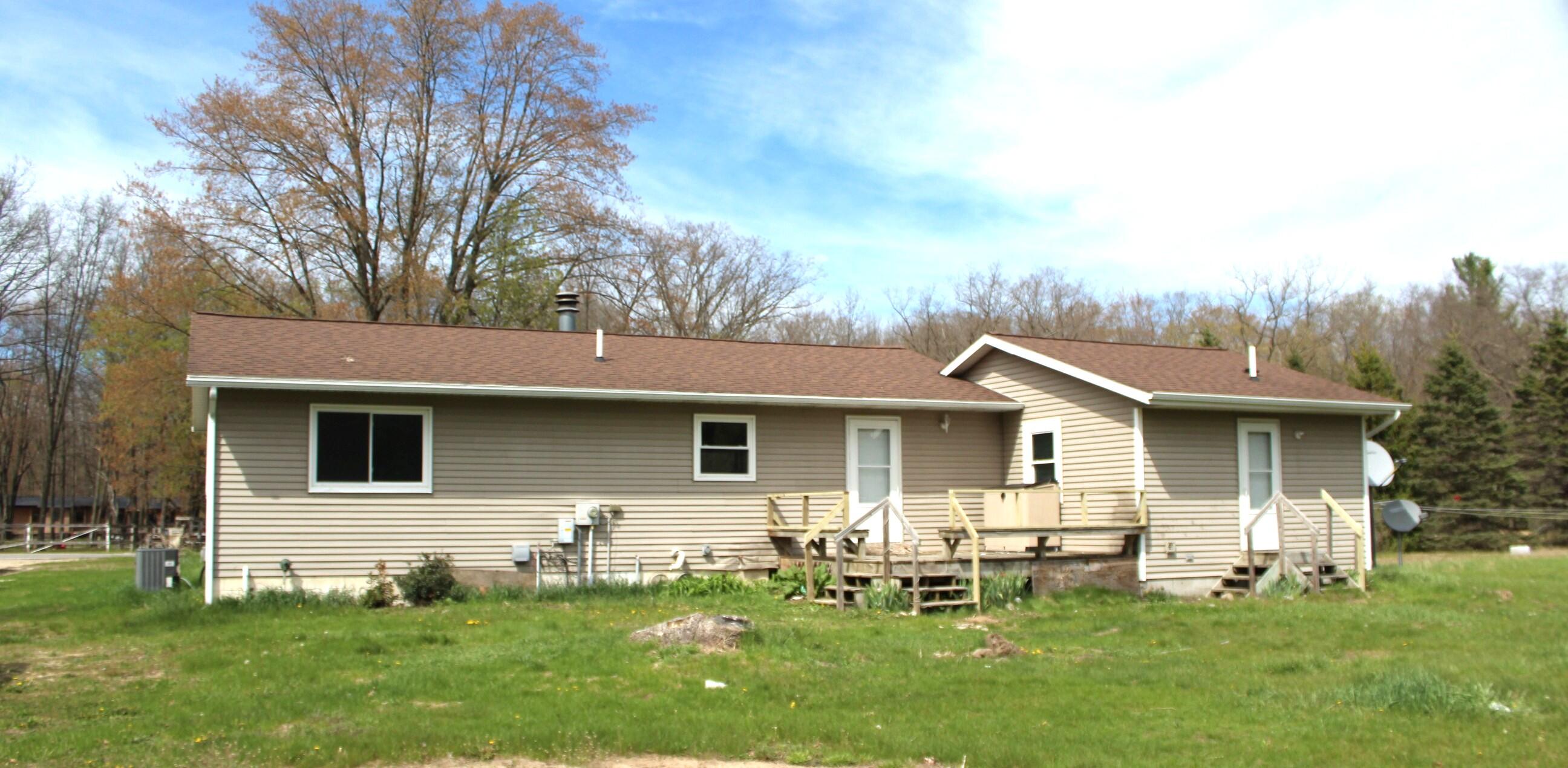 2465 East Arthur Road Rothbury, MI 49452 - Photo 3 of 15 REAR