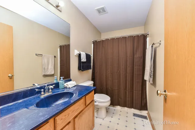 a room with pool table and a projector