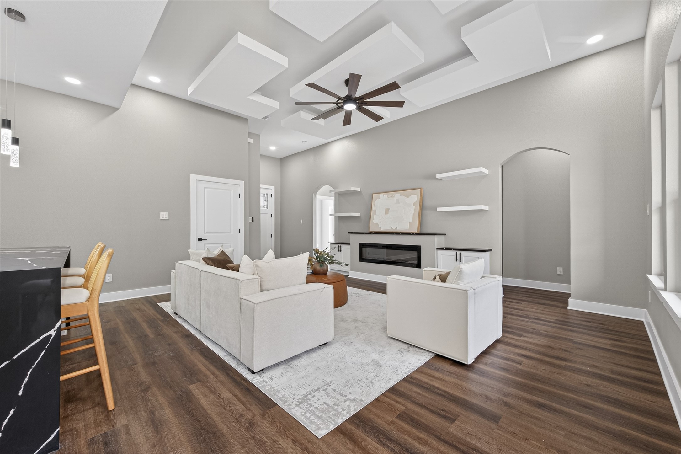 265 County Road 3376 Cleveland, TX 77327 - Photo 11 of 38 a living room with fireplace furniture and a wooden floor
