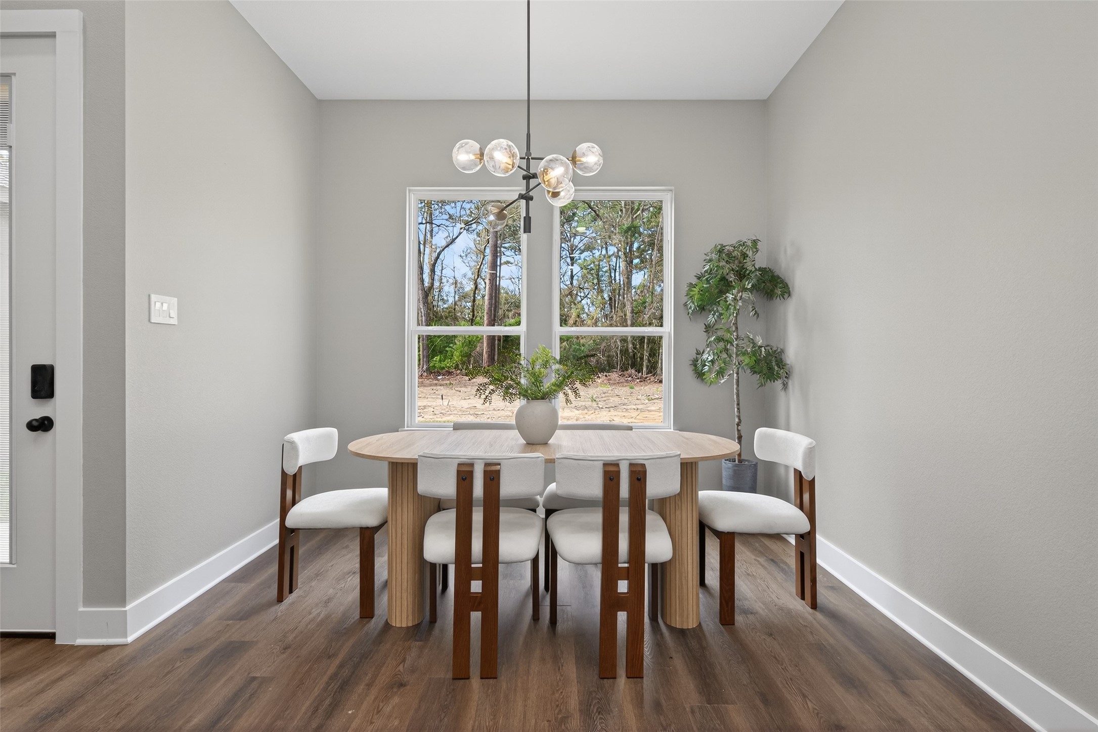 265 County Road 3376 Cleveland, TX 77327 - Photo 17 of 38 a view of a dining room with furniture window and outside view