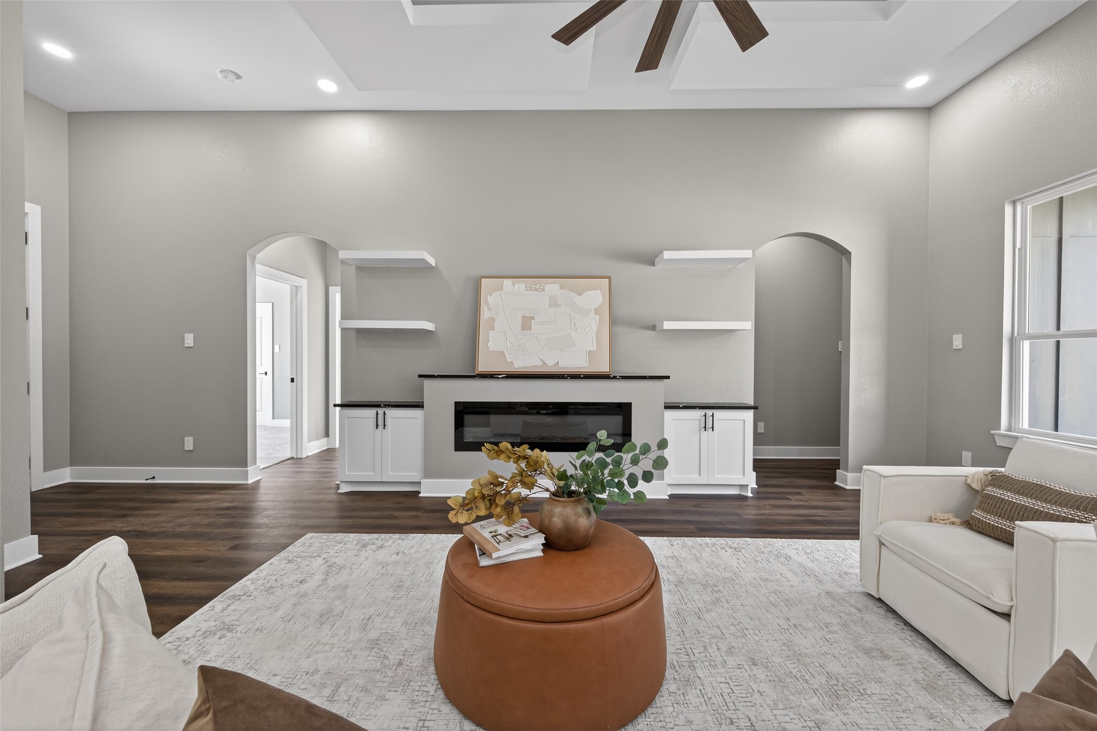 265 County Road 3376 Cleveland, TX 77327 - Photo 18 of 38 a living room with furniture and a chandelier