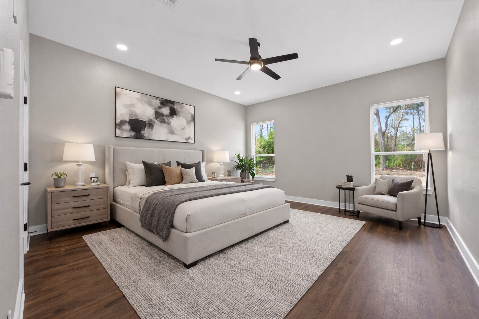 265 County Road 3376 Cleveland, TX 77327 - Photo 19 of 38 a bed room with bed and windows